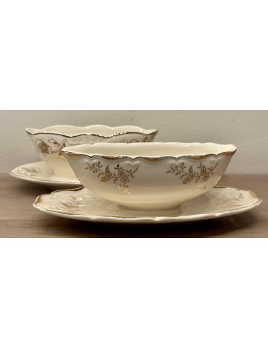 Gravy boat / Sauce boat - Boch - oblong narrow model - shape ONDINE - décor FRANCOISE with small gold colored flowers
