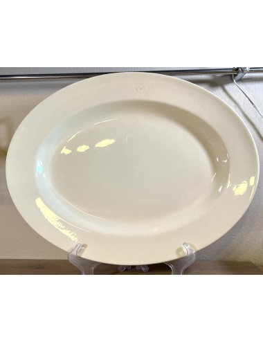 Plate - large model - unmarked (Boch?) - executed in all beige color