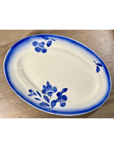 Plate - flat, oval, model - unmarked, blind mark 1142 - aérosol decor / spray decor of blue flowers