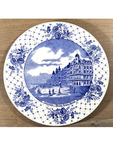 Plate / Decorative plate - Boch (1860-?) - border: PAQUERETTE et paysages touristiques in blue