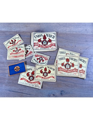Large collection of old cigar bands and matchbox labels.
