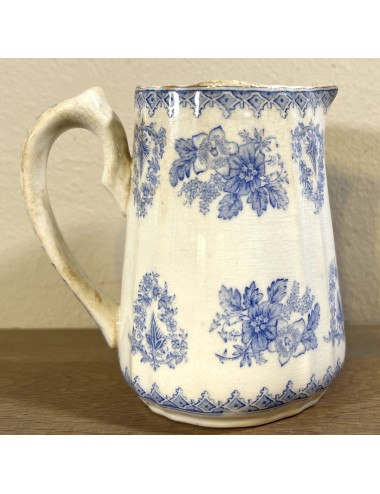 Milk jug / Water jug - smaller model - Petrus Regout - décor SIKA executed in blue