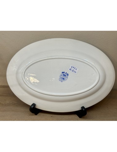 Plate - larger, oval, model - Boch - décor DUX executed in bright blue.