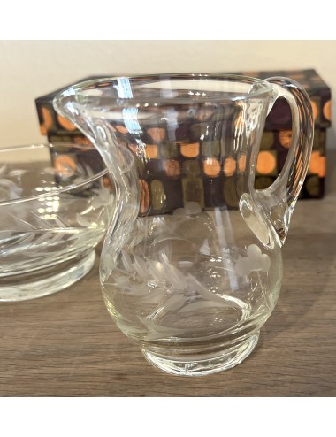 Milk jug and Sugar bowl - clear glass with cut décor