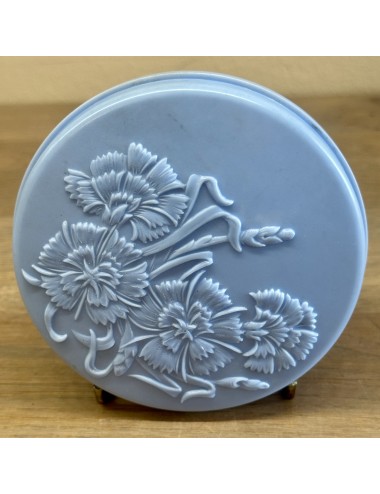 Powder box - blue bakelite with embossed décor of cornflowers