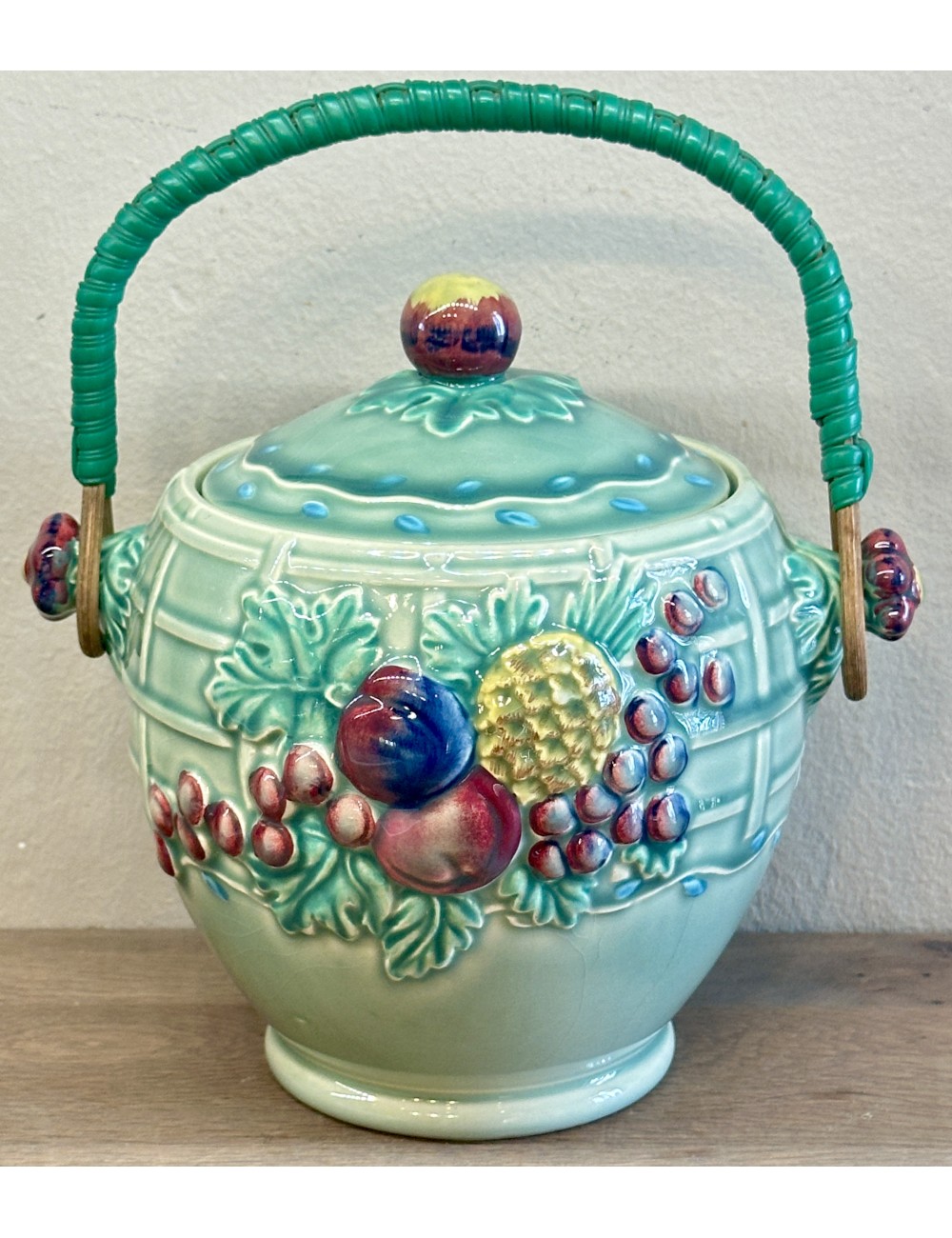 Biscuit jar with wicker/plastic handle - A.J. Wilkingson / Royal Staffordshire Pottery - shaped like a fruit basket