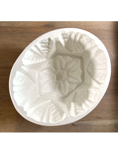 Pudding mould - large white porcelain model with leaf shape and flower incorporated in bottom