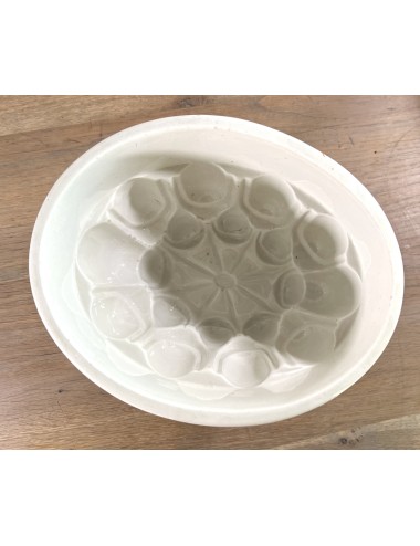 Pudding mould - large white porcelain model with cobweb-like shape incorporated in bottom