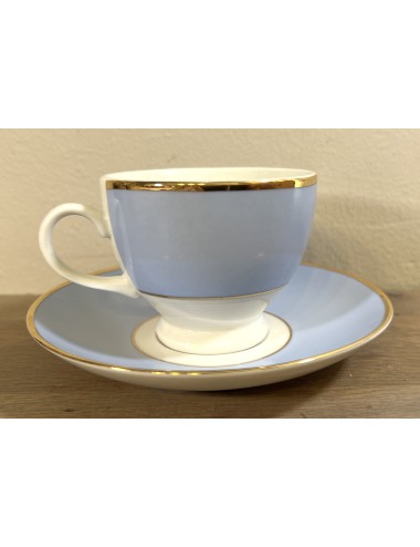 Cup and saucer - Doulton 2004 - finished in light blue with white and gold piping