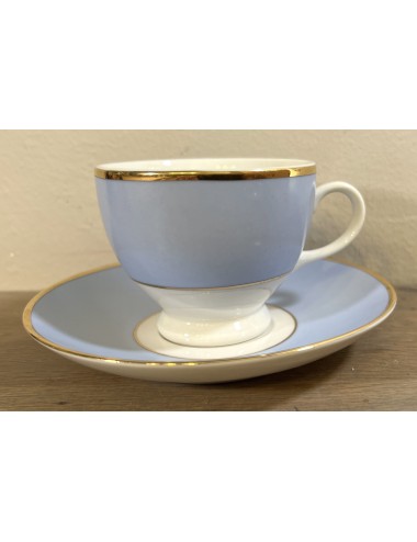 Cup and saucer - Doulton 2004 - finished in light blue with white and gold piping