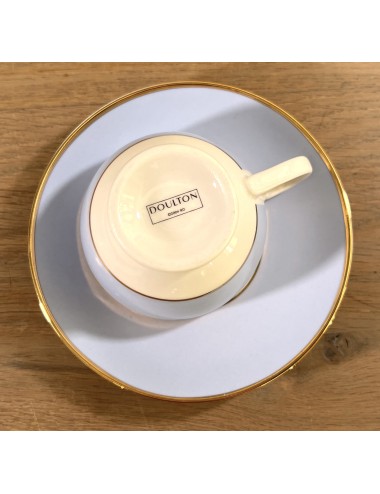 Cup and saucer - Doulton 2004 - finished in light blue with white and gold piping