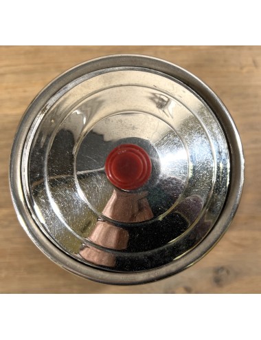 Storage jar executed in chrome with more red Bakelite lid knob