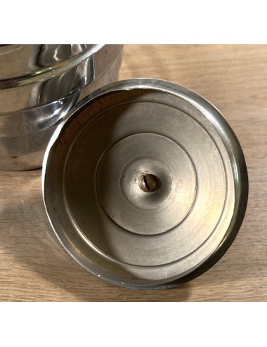 Storage jar executed in chrome with more red Bakelite lid knob