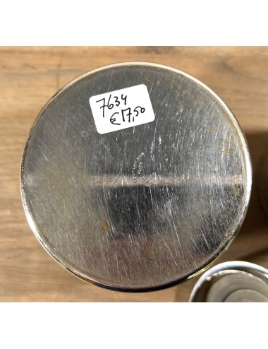 Storage jar executed in chrome with more red Bakelite lid knob