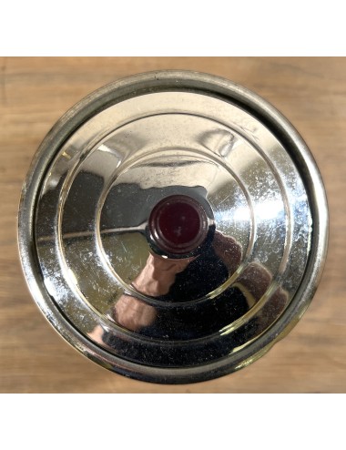 Storage jar executed in chrome with more brown bakelite lid knob